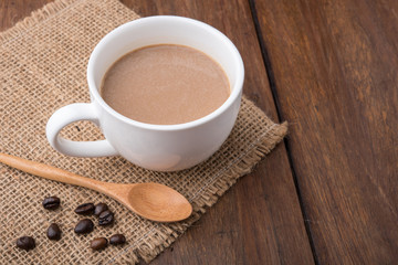 Coffee cup and coffee beans