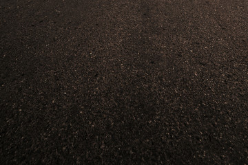 Black Asphalt road  landscape scene. Grain black textured background