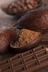 Chocolate bar, candy sweet, dessert food on wooden background