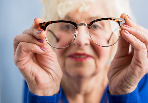 Grandma looking through her glasses