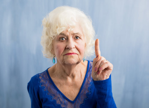 Grandma holding her finger up