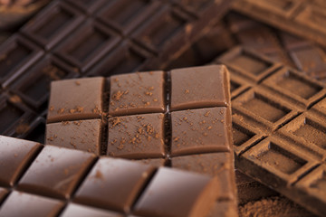 Chocolate bar, candy sweet, dessert food on wooden background