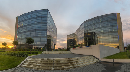 Obraz na płótnie Canvas modern complex of office buildings in the evening