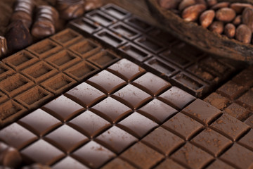 Chocolate sweet, cocoa pod and food dessert background