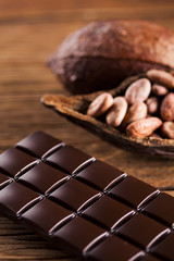 Bars Chocolate , candy sweet, dessert food on wooden background