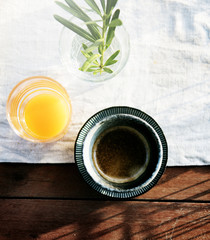 Fresh Orange Juice and Coffee with White Cloth