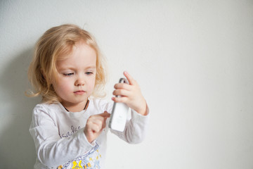 a beautiful little girl making a selfie