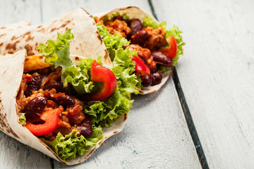 Tortilla with mincemeat and beans