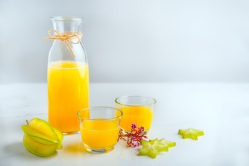 Fresh squeezed star fruit juice on the table for your health.