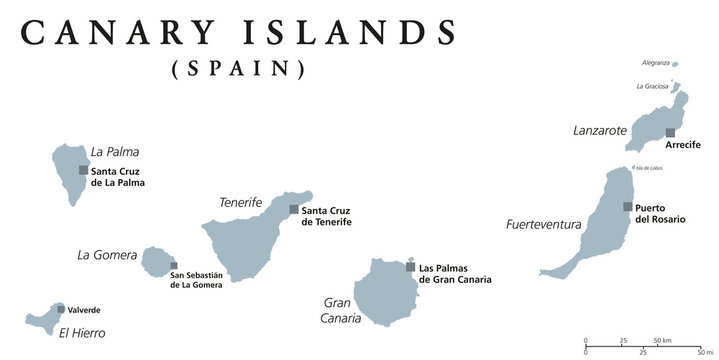 Canary Islands political map with capitals Las Palmas and Santa Cruz. The Canaries are an archipelago and autonomous community of Spain in Atlantic Ocean. Gray illustration, English labeling. Vector.