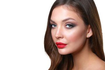 Fototapeta premium Portrait of beautiful young woman face. Isolated on white background