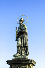 Fototapeta premium Prague, statue on Carls Bridge, Czech Republic