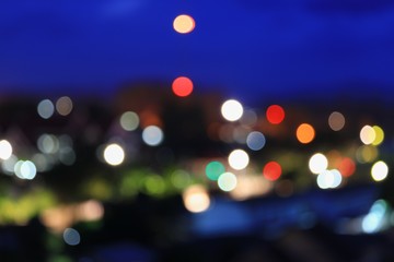 Abstract bokeh multi-color city blurred elevated night view for background with copy space for add text