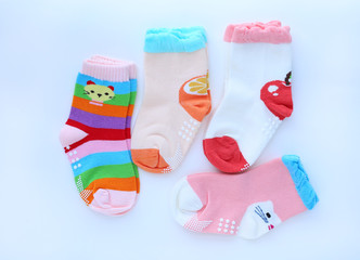 Baby socks on white background. Top view