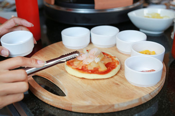 Homemade pizza in process