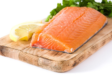 Raw salmon fillet isolated on white background
