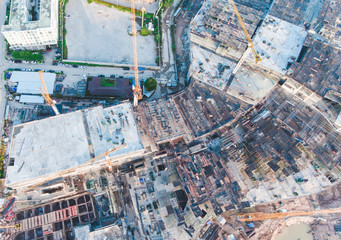 Aerial view of construction site and large crane