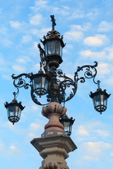 Fototapeta na wymiar Street lamp on sky background.