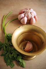 Garlic, parsley and mortar