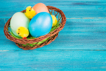 Colored eggs in the basket