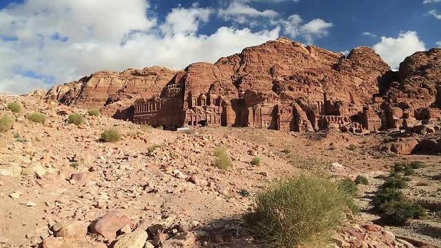 Petra - ancient historical and archaeological rock-cut city in Hashemite Kingdom of Jordan. Overall view of Royal Tombs, from left to the right - Palace Tomb, Corinthian Tomb, Silk Tomb and Urn Tomb