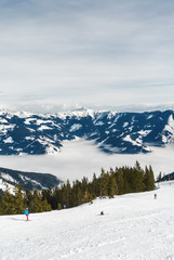 Fototapeta premium Sunny view of ski slope near Zell am Zee, Austria.