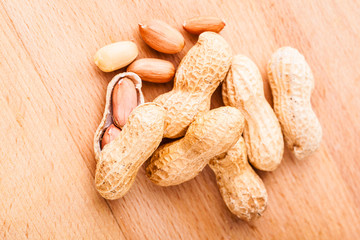 peanuts on wooden board