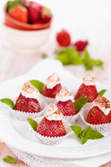 Obraz na płótnie Canvas Strawberry dessert with mint.