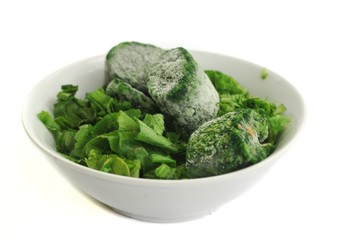 Frozen herbs in the white plate
