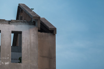 abandoned building with sky background.