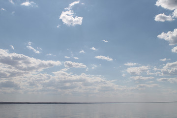 the sky reflected in the water, deserted beach lake, summer sky, nature, blue cloud,