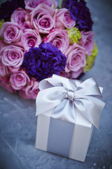 Gift box with flower bouquet 