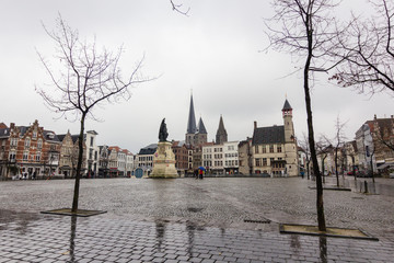 Architecture of streets of Gent town, Belgium in rainy day in winter