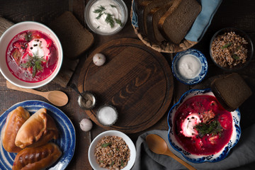 Traditional Russian dishes on the wooden table horizontal