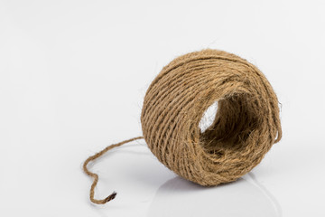Skein of jute twine isolated on white background.