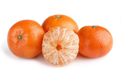 Ripe mandarin close-up on a white background. Tangerine orange. Colorful Food and drink still life concept. Fresh fruits and vegetables on color background. Clementine. Citrus. Fresh fruits. Diet.