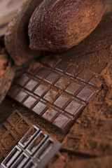 Chocolate bar, candy sweet, dessert food on wooden background