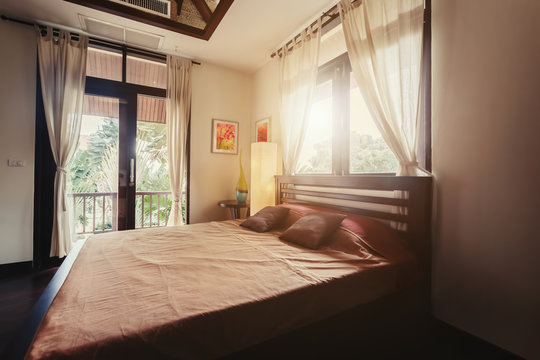 Bed room with balcony villa interior
