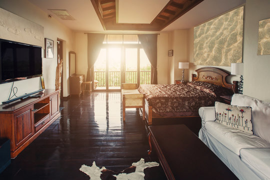 Bed room with balcony villa interior