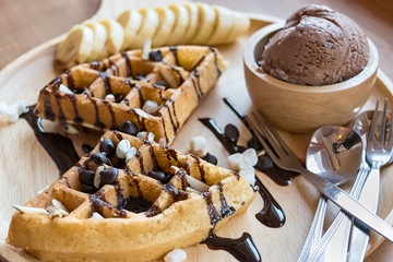 delicious sweet dessert : homemade waffle with chocolate sauce