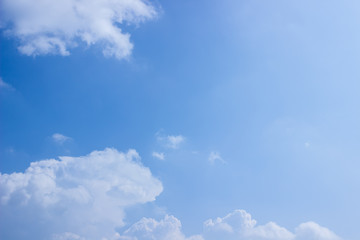 White fluffy clouds in the blue sky