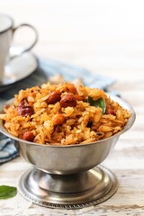 Tamarind Poha / Puli Aval - South Indian breakfast with flattened rice, selective focus