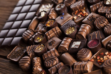Praline Chocolate on wooden backgroud