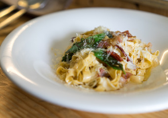 Fresh Pasta Pasta carbonara. fettuccine with bacon and parmesan cheese