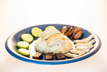 hainanese  chicken rice in plate