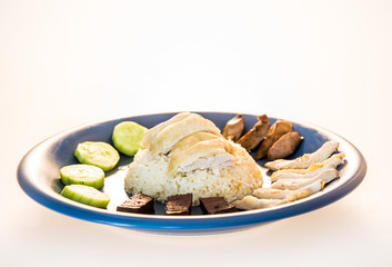 hainanese  chicken rice in plate