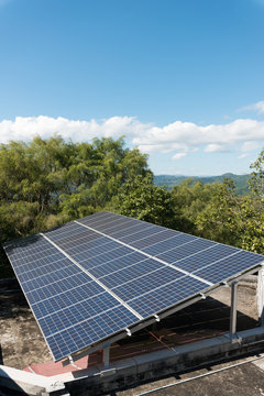 Solar panel with blue sky whit cloud with tree