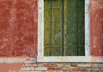 Fototapeta na wymiar Detail of the balcony of a colorful house on the island of Buran