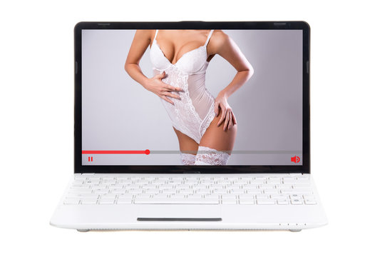 erotic video with sexy woman in lingerie on laptop screen isolated on white