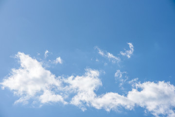 white clouds against blue sky